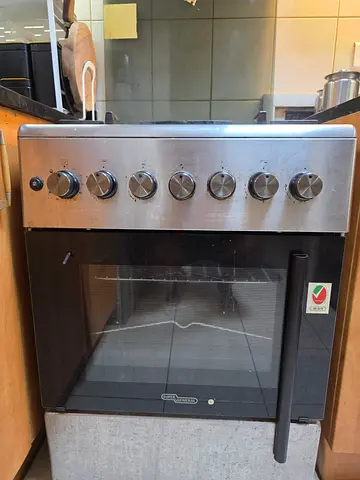 Used stainless steel gas oven with stovetop - good working condition
