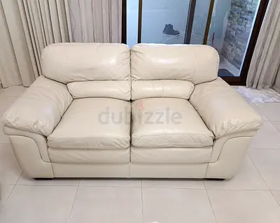 Cream Leather 2-Seater Sofa - Comfortable, Good Condition