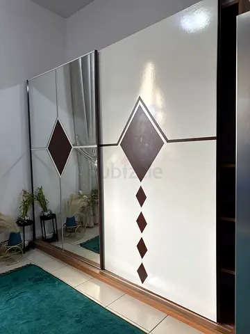 White Sliding Wardrobe with Mirrored Panel and Diamond Inlay