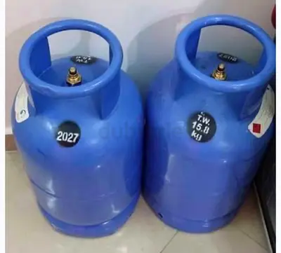 Two blue 15.8 kg LPG gas cylinders - good condition
