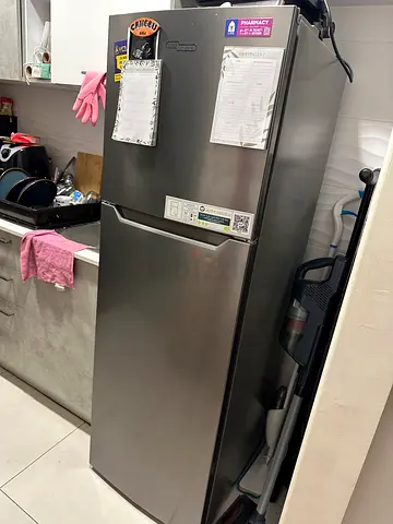 Used single-door stainless steel refrigerator. As good as new