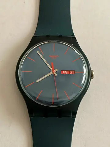 Simple green Swatch-style quartz watch with day/date