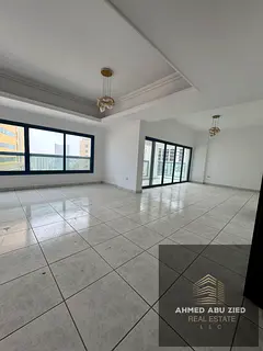 Two bedrooms and a living room in Sharjah with a large balcony and open view, located in Al Majaz 2