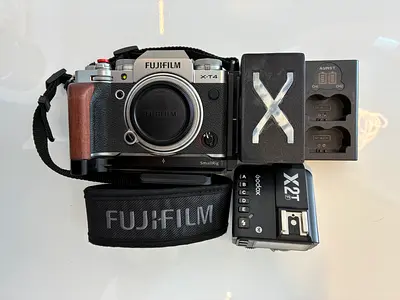 Fujifilm X-T4 mirrorless camera body with accessories (strap,2 battery ,2 lenses , Godox X2T)