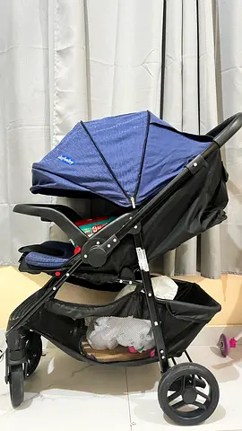 Compact navy baby stroller with canopy — good condition