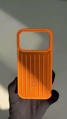 orange Rimowa phone case