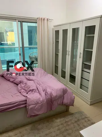 Furnished 1 bedroom hall for rent in Al Nuaimiya 3 Ajman City Tower balcony parking prime location 0 yearly security cheque