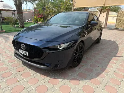 As new, unmarked Mazda 3 with Service Contract and Under Factory Warranty