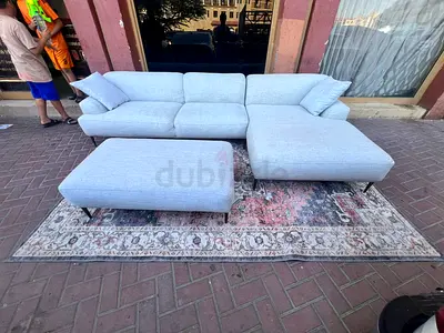 Excellent condition the loom collection feather filled lshape sofa with footstool