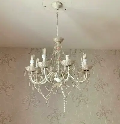 Chandelier with eight arms (with bulbs). Pick up from Al Barsha 2