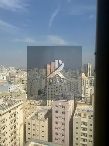 Two bedrooms, a living room, a storage room, and a balcony + 3 bathrooms in Al Majarah - a steal. P