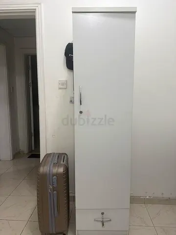 Slim white wardrobe / tall storage cabinet - good condition