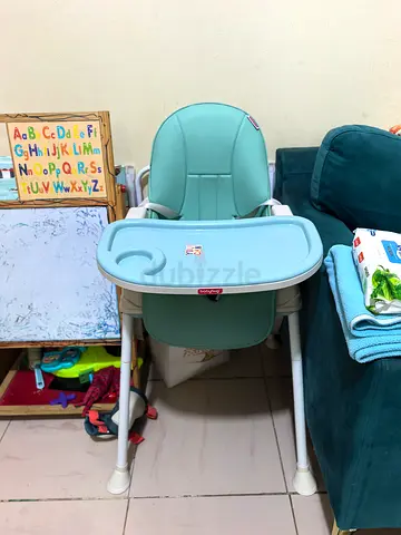كرسي مرتفع للأطفال