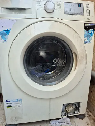 Used front-load washing machine - works, needs minor repair