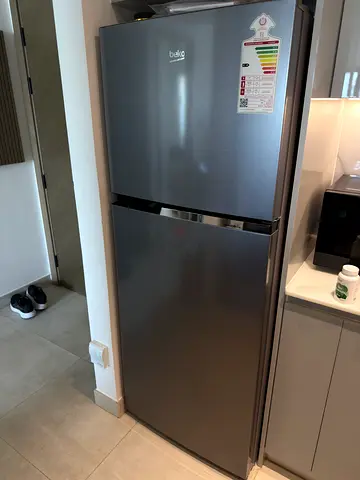 Good condition Beko two-door refrigerator - stainless finish