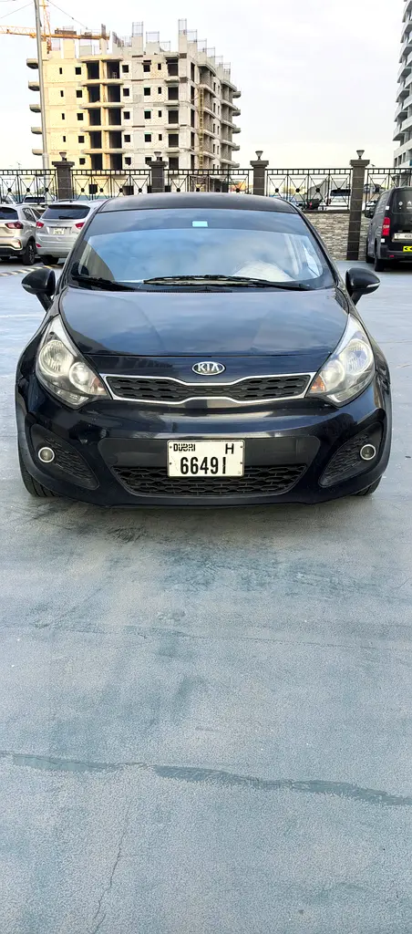 Kia Rio 2015 — photo 1 of 8