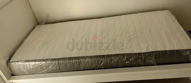 Ikea brimness day bed frame with 2 storage drawers underneath and with 2 IKEA mattresses is availabl