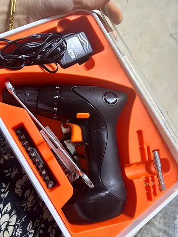 Cordless Electric Screwdriver / Mini Drill with Charger and Bits - Good Condition