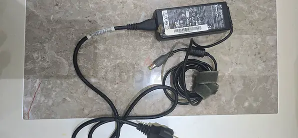 Genuine laptop power adapter/charger with power cord - working condition