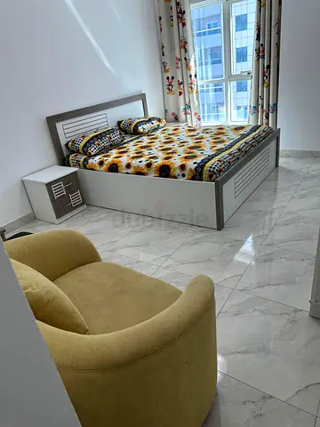 Furnished room with attached bathroom
