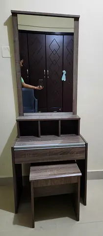 Dressing table with mirror and wooden chair