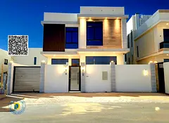 For sale in Al Zahiyah, luxurious modern villa with 5BR and roof. Super deluxe finishing. Bank finan