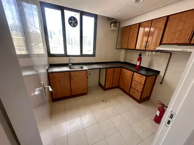 Two-bedroom apartment for annual rent in Abu Shagara, Sharjah. 2 bathrooms, prime location near Lulu Hypermarket and Cooperative Society, split AC.