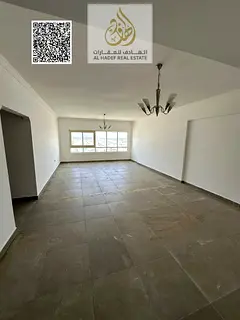 Two-bedroom apartment with a living room for annual rent, including parking and one month free. Larg