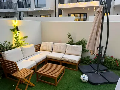 Outdoor seating + umbrella + outdorr dining table