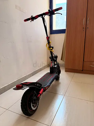 Dual-motor Electric Scooter with Off-road Tires - Good Condition