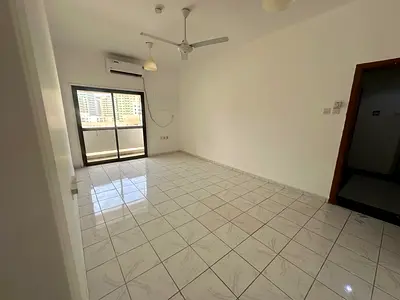 The finest and most luxurious two-bedroom apartment with a living room for annual rent in Sharjah, Abu Shagara area. Two bathrooms, split air conditio