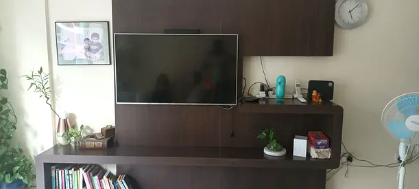 Dark wood TV entertainment unit Including TV