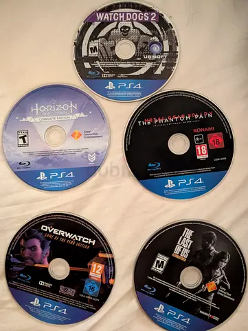 Bundle of 5 PS4 Game Discs — Horizon, Watch Dogs 2, The Phantom Pain, Overwatch, The Last of Us