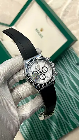 Rolex Daytona style chronograph watch on black rubber strap