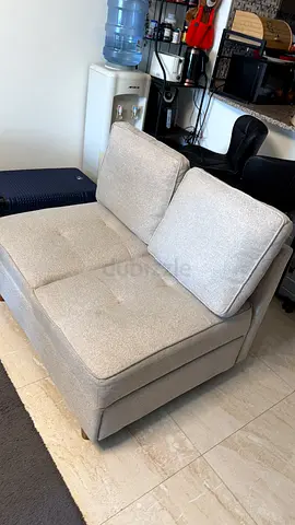 Light grey single-seater sofa chair in good condition
