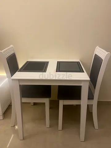 White 2-Seater Dining Table with Cushioned Chairs - Good Condition