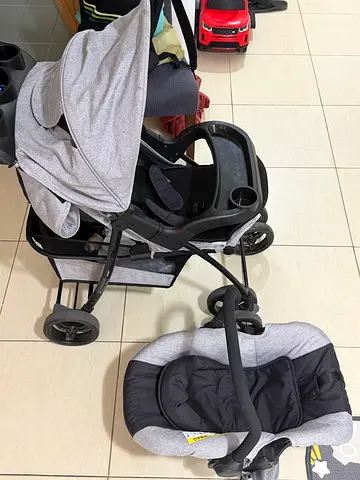 Light grey travel system: stroller with infant car seat (used)
