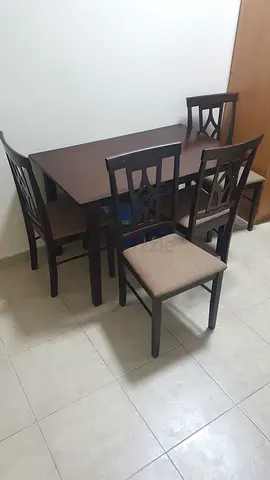 Wooden 4-Seater Dining Table with Cushioned Chairs - Good Condition