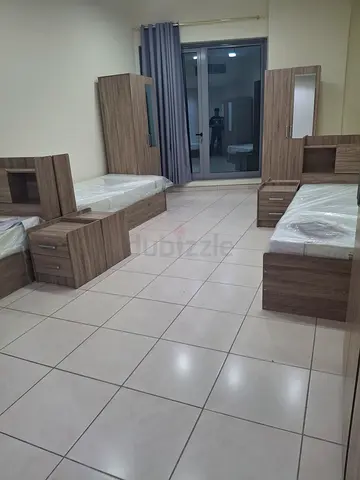 Bed space in hall with attached balcony