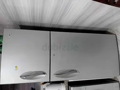 Silver Double-Door Refrigerator with Top Freezer - Good Condition