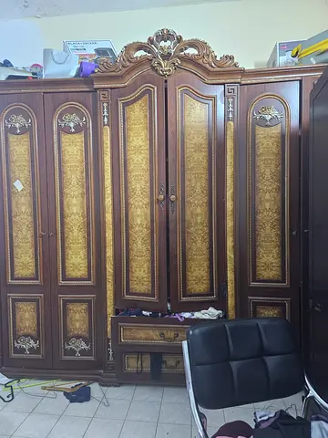Large Ornate Wooden Wardrobe with Carved Details