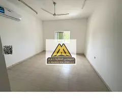 Spacious studio Al Mowaihat 3 Ajman. Semi kitchen, split AC. Direct Dubai exit, near services. AED 1