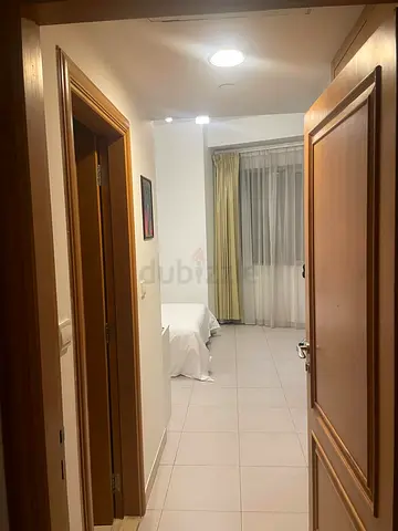 Room for rent (single lady) | Sheikh Zayed Road | Walking distance to Emirates Towers Metro | Prime