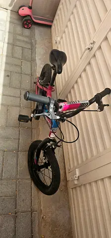 Kids pink balance bike / small bicycle — good used condition