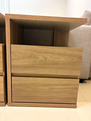 Oak-finish bedside cabinet with two drawers - excellent condition