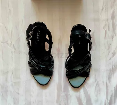 Aldo new high heels genuine leather shoes size 39 for 100 AED.