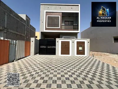 Villa for sale in Ajman, including registration fees and air conditioning | Al Zahia area | 4 bedrooms, majlis, living room and maid's room | Freehold