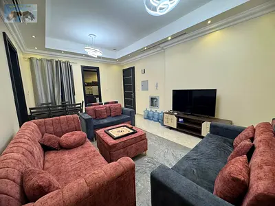 Luxurious furnished apartment | 3 bedrooms and a living room | Brand new furniture | Located near Dubai exit | Available for sharing