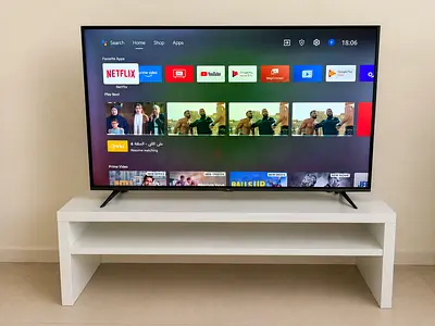 TCL 55” Smart TV + IKEA Table – For Sale