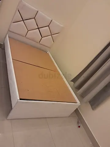 White upholstered double bed frame with padded headboard - good condition